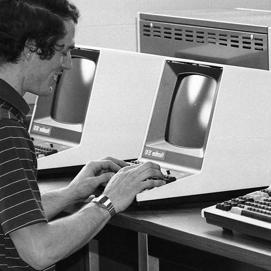 An unidentified student is showing what the Hazeltine 1510 computer can do, c. 1977.